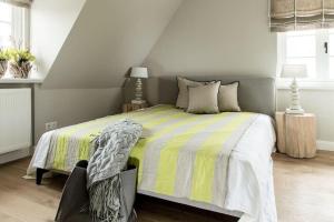 Postel nebo postele na pokoji v ubytování Home-by-Sea + 3 fotografie