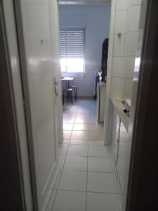 Ένα μπάνιο στο MELHOR LOCALIZAÇÃO DE SANTOS, LOFT, 200 MTS da PRAIA, WI-FI, AR CONDICIONADO +27 φωτογραφίες