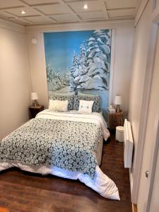 מיטה או מיטות בחדר ב-Suite 3, Flèche du fjord, vue Saguenay, Mont Valin