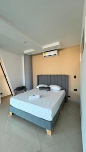 Postel nebo postele na pokoji v ubytování Hotel Gran Conquistador 33