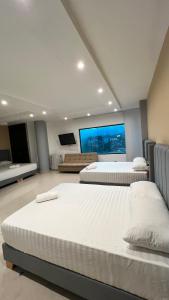 Postel nebo postele na pokoji v ubytování Hotel Gran Conquistador 33