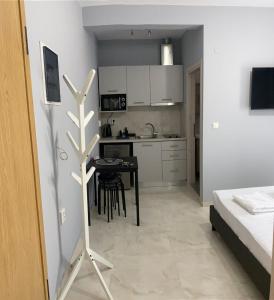 Кухня или кухненски бокс в Umbrella Apartment