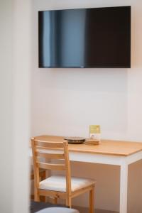 TV a/nebo společenská místnost v ubytování Kalkalpen Apartments