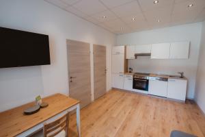 Kuchyň nebo kuchyňský kout v ubytování Kalkalpen Apartments