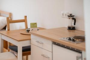 Kuchyň nebo kuchyňský kout v ubytování Kalkalpen Apartments