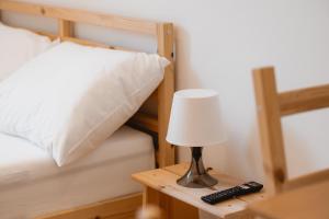 Postel nebo postele na pokoji v ubytování Kalkalpen Apartments