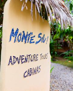 a sign that says make a skill adventure tour drinks at Cabinas Montesol in Puerto Viejo