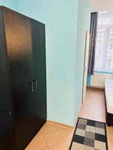 Postel nebo postele na pokoji v ubytování Angel Hotel