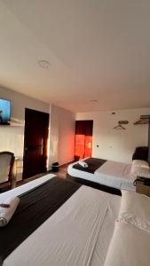 Postel nebo postele na pokoji v ubytování Hotel Gran Conquistador 33
