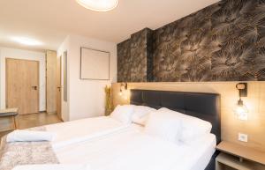 Posteľ alebo postele v izbe v ubytovaní Autohof 171 Hotel Hegyeshalom