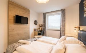 Posteľ alebo postele v izbe v ubytovaní Autohof 171 Hotel Hegyeshalom