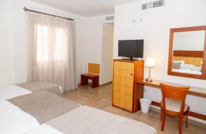 TV a/nebo společenská místnost v ubytování Hotel Córdoba Centro