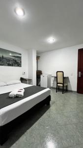 Postel nebo postele na pokoji v ubytování Hotel Gran Conquistador 33