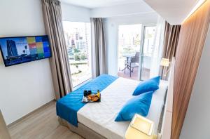 TV a/nebo společenská místnost v ubytování Hotel Rosamar
