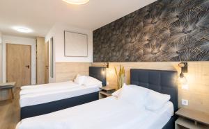 Postel nebo postele na pokoji v ubytování Autohof 171 Hotel Hegyeshalom + 37 fotografií