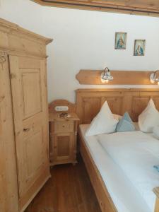 Cama o camas de una habitación en Ferienwohnung Tramunt
