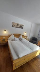 Cama o camas de una habitación en Ferienwohnung Tramunt