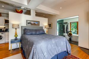 a large bedroom with a bed and a kitchen at Well-Designed Santa Monica Studio Less Than 1 Mi to Beach in Los Angeles