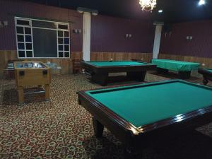 a room with two pool tables in it at HOSTERIA RANCHO SANTA FE in Cotacachi