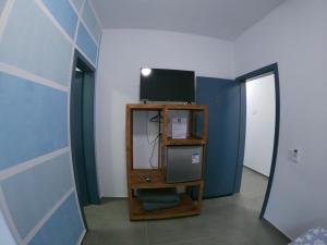 Pousada Silvestre tesisinde bir televizyon ve/veya eğlence merkezi