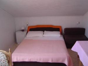 Posteľ alebo postele v izbe v ubytovaní Apartments Tina