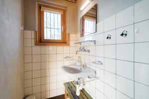 Koupelna v ubytování Chalet Engihalde