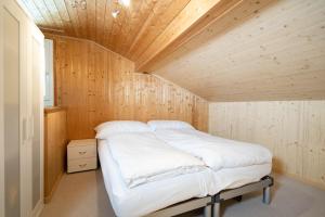 Cama o camas de una habitación en Chalet Chapfwald