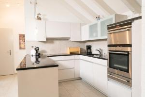 Dapur atau dapur kecil di Apartment Hinterberg