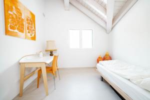 Rúm í herbergi á Apartment Soldanella