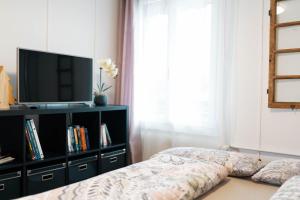 Rúm í herbergi á Apartment Heimathus