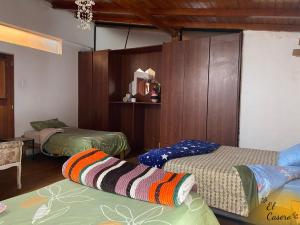 Zimmer mit 2 Betten in einem Zimmer in der Unterkunft MiniDepa Acogedor y Céntrico -H. El Casero in Cajamarca