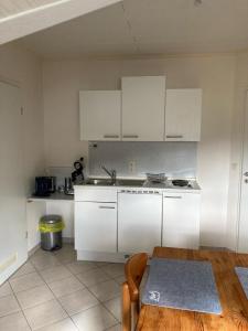 Kuchyň nebo kuchyňský kout v ubytování Appartment Haus Müller