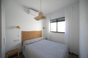 Postel nebo postele na pokoji v ubytování Tradicional apartamento central de 2 camas dobles