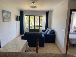 Posedenie v ubytovaní Apartamentos Playa Langosteira