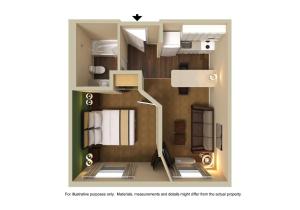 a floor plan of a room with a bathroom at MainStay Suites Raleigh North in Raleigh