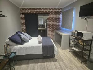 @241 Enkeldoorn Guesthouse客房内的一张或多张床位