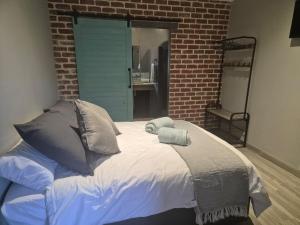 @241 Enkeldoorn Guesthouse客房内的一张或多张床位