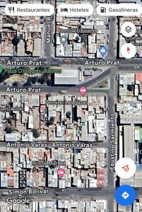 un mapa de una ciudad con edificios y señales de calle en Hostal Las Ñipas, en Calama