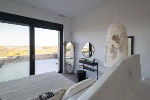 Łóżko lub łóżka w pokoju w obiekcie Family & Golf VILLA LAGUNA TOWERS Gialova Navarino