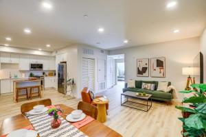 a living room with a couch and a table at Chic San Luis Obispo Condo Near Hiking and Beaches! in San Luis Obispo