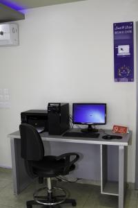 Een TV en/of entertainmentcenter bij Rofan house serviced apartments
