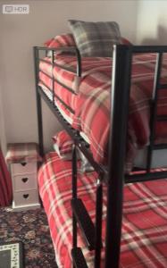 Кровать или кровати в номере Sarnia holiday flats
