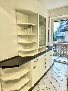 KM Apparts Wesel 3 tesisinde mutfak veya mini mutfak