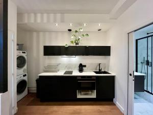 Kuchyňa alebo kuchynka v ubytovaní Appartement Le Médicis - 2 chambres