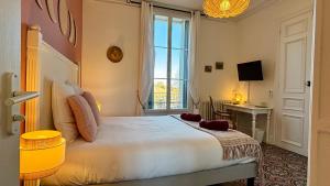 Postel nebo postele na pokoji v ubytování Casa-Belle