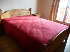 Ліжко або ліжка в номері Chalet Les Aiguilles - 5 Pièces pour 8 Personnes 04