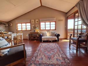Posezení v ubytování Nyala Bush Cabin