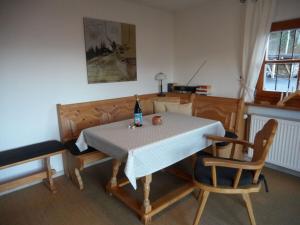a dining room with a table and two chairs at Lovely apartment in Berchtesgaden in Berchtesgaden