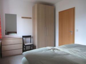 Säng eller sängar i ett rum på Nice apartment in Weimar