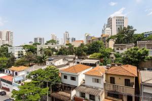 a view of a city with tall buildings at Domy in Sao Paulo